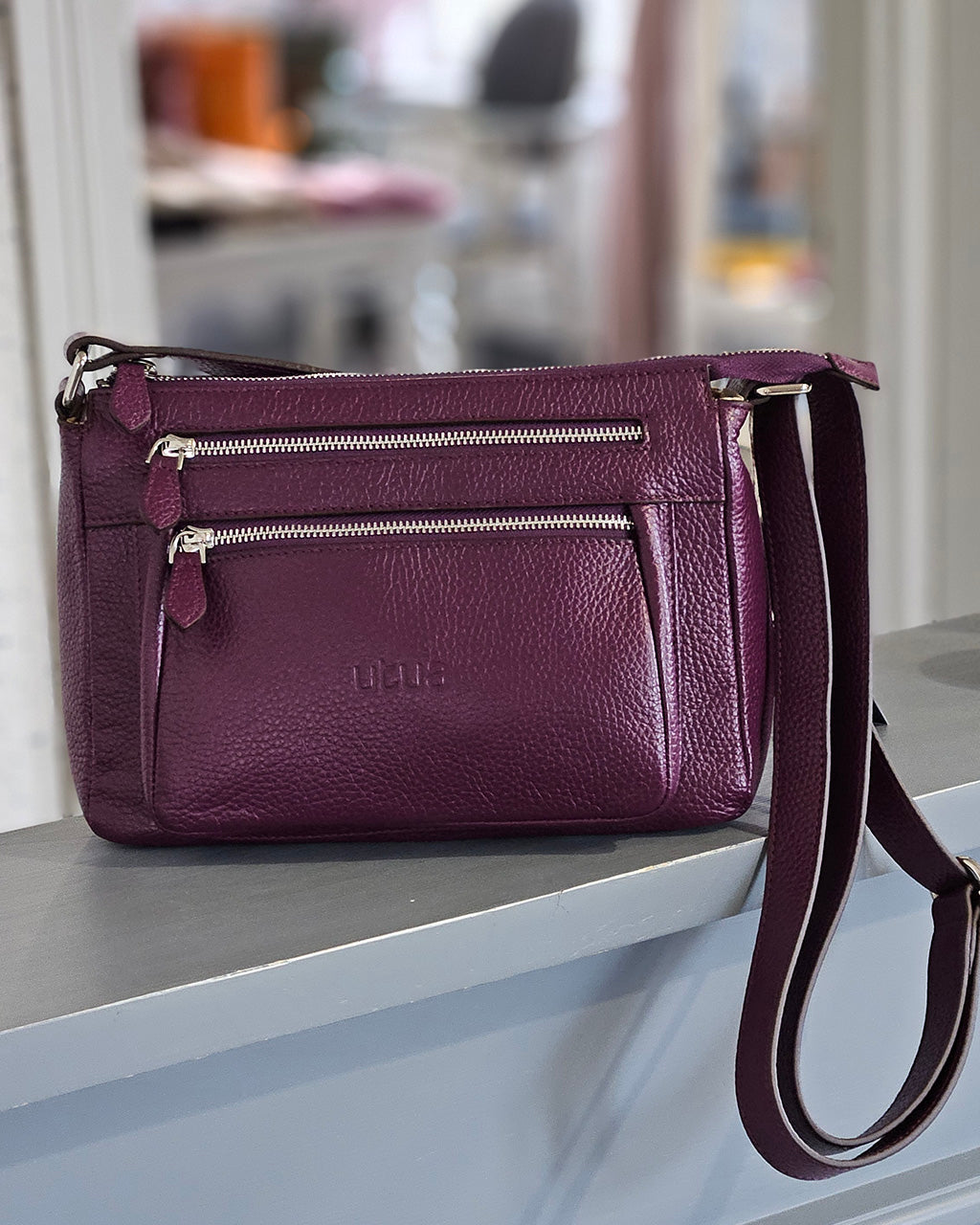 hestia tumma violetti olkalaukku utua