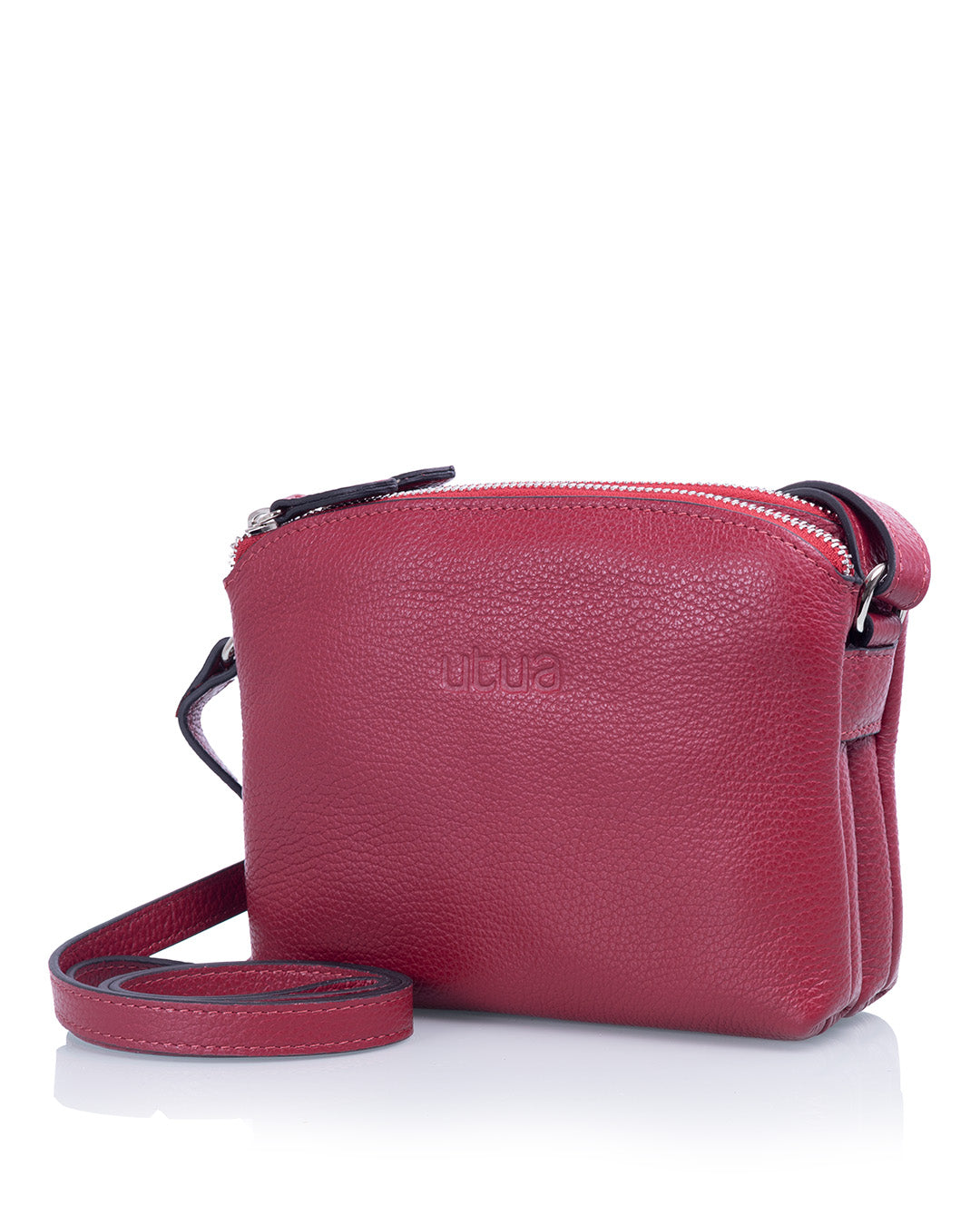 lysti puolukanpunainen pikkulaukku utua nahkainen sivulta