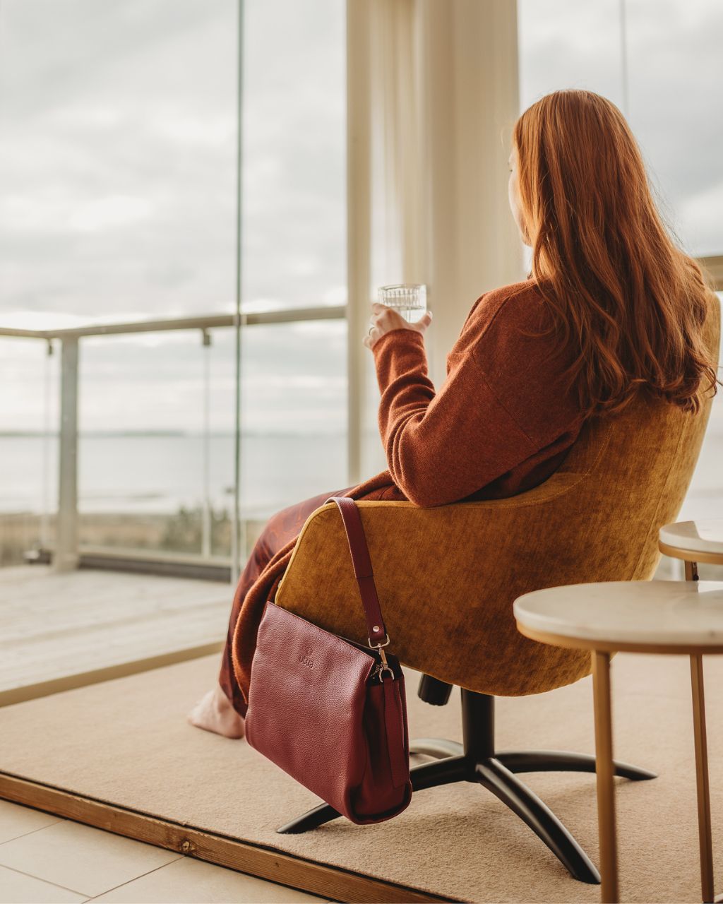 ruskea ingrid kasilaukku aitoa nahkaa