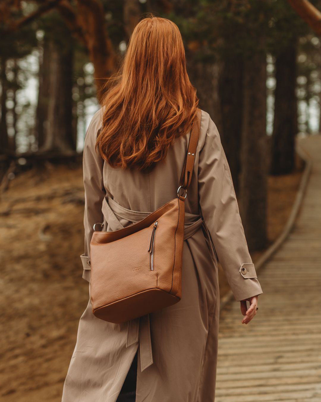 utua roihu ruskea olkalaukku crossbody