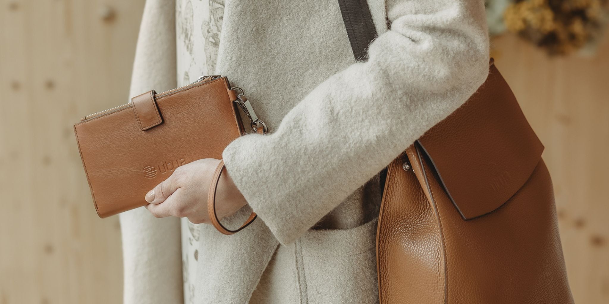 Utua nahkainen puhelinlompakko ruskea