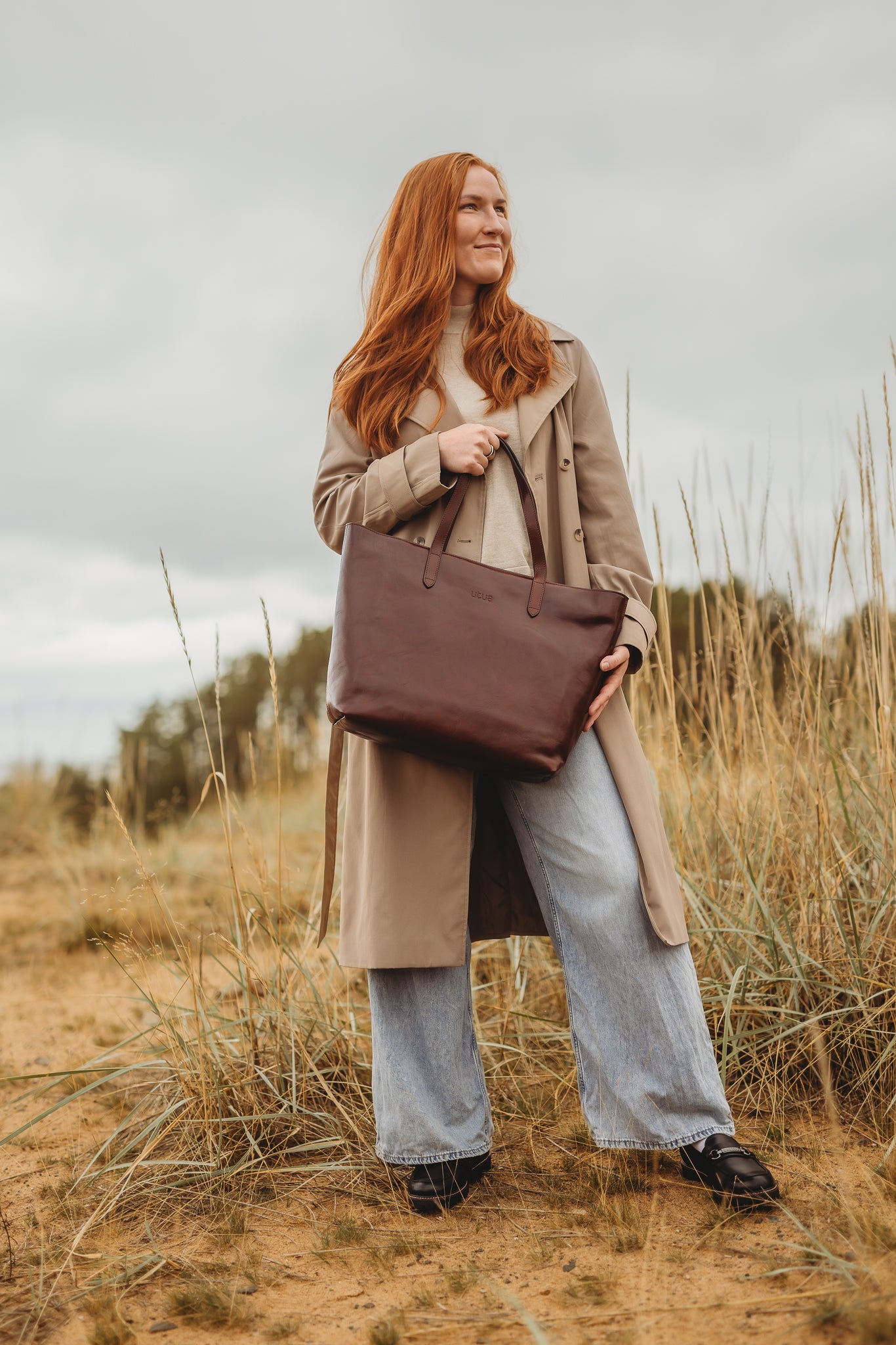 utua-ruskea-lund-kasviparkittu-tyolaukku